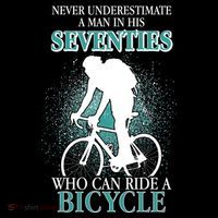 Never Underestimate A Man In His Seventies Who Can Ride A Bicycle Hooded Wearable Blanket