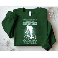 Never Underestimate A Man In His Seventies Who Can Ride A Bicycle Sweatshirt