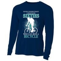 Never Underestimate A Man In His Sixties Who Can Ride A Bicycle Cooling Performance Long Sleeve Crew