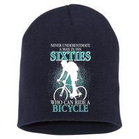 Never Underestimate A Man In His Sixties Who Can Ride A Bicycle Short Acrylic Beanie