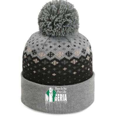 Nigerian Flag Raised Fist The Baniff Cuffed Pom Beanie