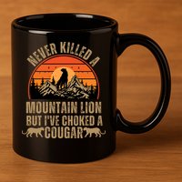 Never Killed A Mountain Lion But I've Choked A Cougar Quotes 11oz C Handle Ceramic Mug