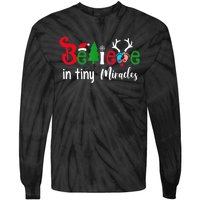 NICU Nurse Believe In Magic Of Tiny Mistletoe Christmas Tie-Dye Long Sleeve Shirt