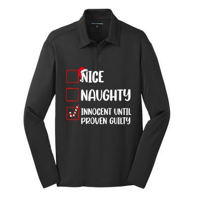 Nice Naughty Innocent Until Proven Guilty Christmas List Silk Touch Performance Long Sleeve Polo