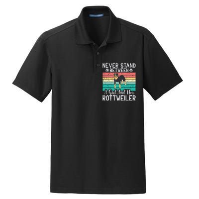 Never Stand Between A Girl And Her Rottweiler Dry Zone Grid Polo