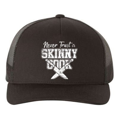 Never Trust A Skinny Cook Yupoong Adult 5-Panel Trucker Hat