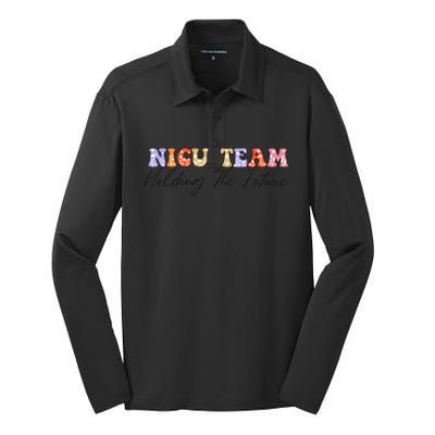 Nicu Team Holding The Future Nicu Nurse Gift Silk Touch Performance Long Sleeve Polo