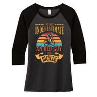 Never Underestimate An Old Guy On A Bicycle Cycling Women's Tri-Blend 3/4-Sleeve Raglan Shirt