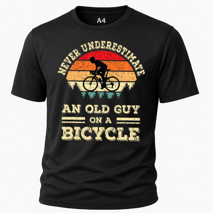 Never Underestimate An Old Guy On A Bicycle Funny Cycling Cooling Performance Crew T-Shirt