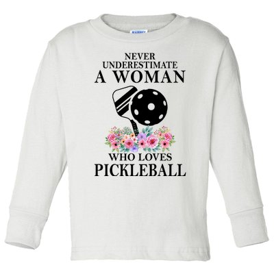 NEVER UNDERESTIMATE A WOMAN PICKLEBALL LQT Toddler Long Sleeve Shirt