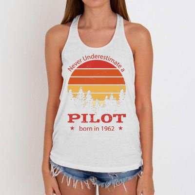 Never Underestimate A Pilot Born In 1962 Women's Knotted Racerback Tank