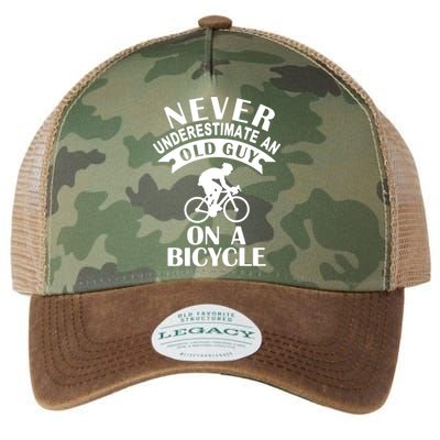 Never Underestimate An Old Guy On A Bicycle Legacy Tie Dye Trucker Hat
