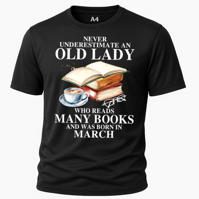 Never Underestimate An Old March Lady Who Reads Many Books Gift Cooling Performance Crew T-Shirt