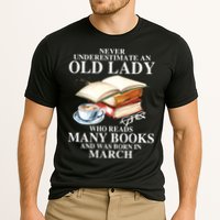 Never Underestimate An Old March Lady Who Reads Many Books Gift Cooling Performance Crew T-Shirt