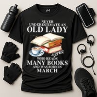 Never Underestimate An Old March Lady Who Reads Many Books Gift Cooling Performance Crew T-Shirt