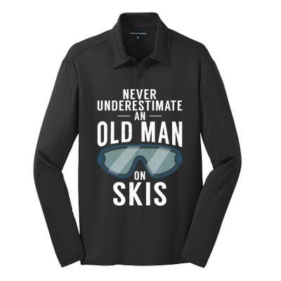 Never Underestimate An Old On Skis Winter Sport Skier Gift Silk Touch Performance Long Sleeve Polo