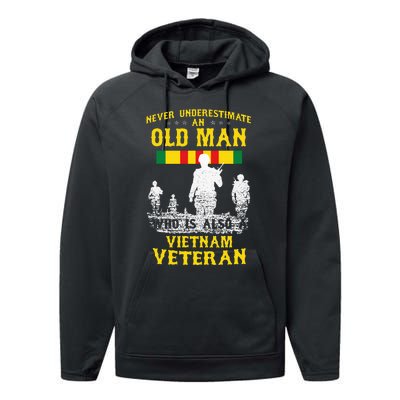 Never Underestimate An OLD MAN Vietnam Veteran Gift Performance Fleece Hoodie