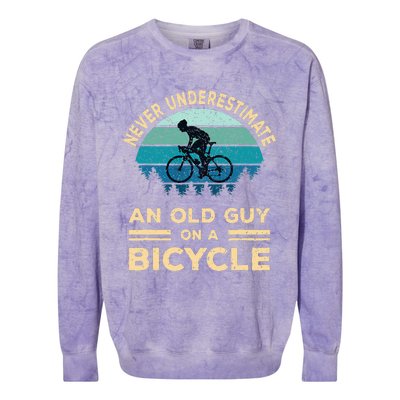 Never Underestimate An Old Guy On A Bicycle Funny Cycling Colorblast Crewneck Sweatshirt