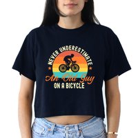 Never Underestimate An Old Guy On A Bicycle Cycling Women's Crop Top Tee