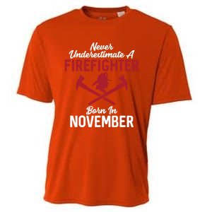 Never Underestimate A Firefighter Born In November Funny Bir Gift Cooling Performance Crew T-Shirt