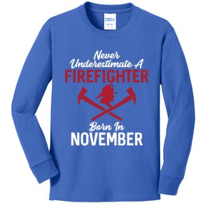 Never Underestimate A Firefighter Born In November Funny Bir Gift Kids Long Sleeve Shirt