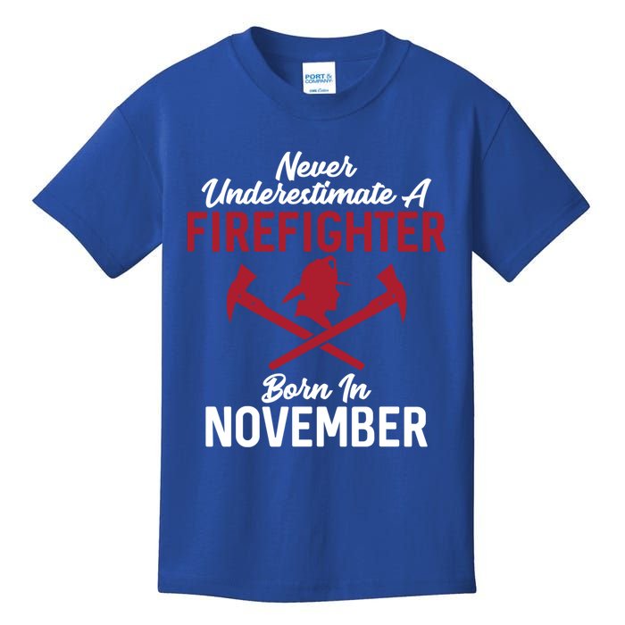 Never Underestimate A Firefighter Born In November Funny Bir Gift Kids T-Shirt