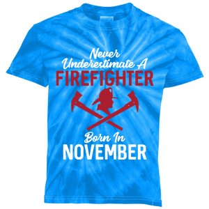 Never Underestimate A Firefighter Born In November Funny Bir Gift Kids Tie-Dye T-Shirt