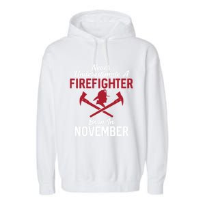 Never Underestimate A Firefighter Born In November Funny Bir Gift Garment-Dyed Fleece Hoodie