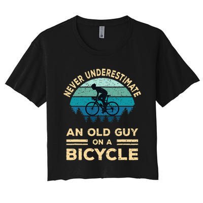 Never Underestimate An Old Guy On A Bicycle Funny Cycling Women's Crop Top Tee