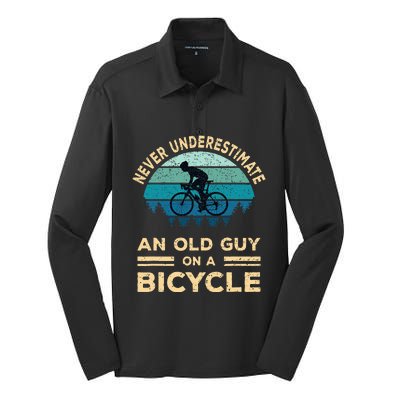 Never Underestimate An Old Guy On A Bicycle Funny Cycling Silk Touch Performance Long Sleeve Polo