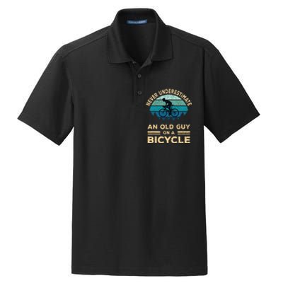 Never Underestimate An Old Guy On A Bicycle Funny Cycling Dry Zone Grid Polo