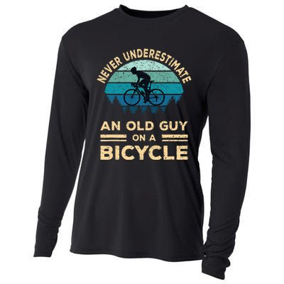 Never Underestimate An Old Guy On A Bicycle Funny Cycling Cooling Performance Long Sleeve Crew