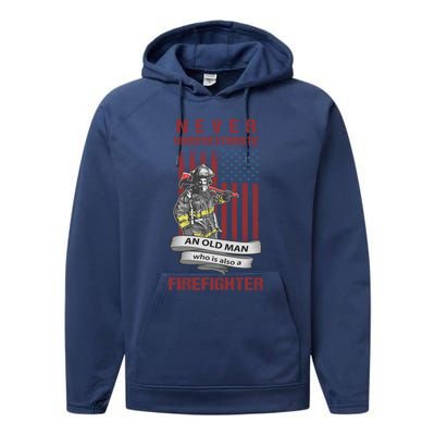 Never Underestimate An Old Who Is Also A Firefighter Gift Performance Fleece Hoodie