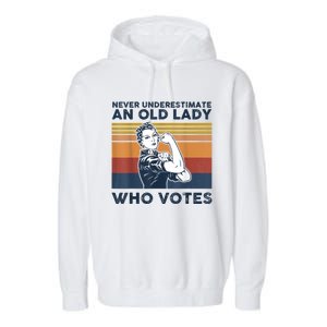 Never Underestimate An Old Lady Who Votes Feminist Gift Garment-Dyed Fleece Hoodie