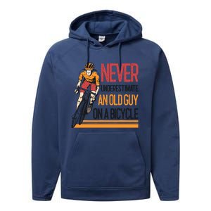 Never Underestimate An Old Guy On A Bicycle Funny Cycling Performance Fleece Hoodie