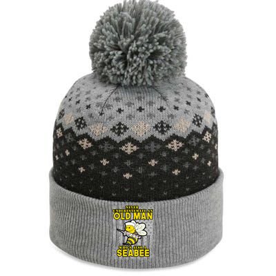 Never Underestimate An Seabee Old Man Sea Shipping The Baniff Cuffed Pom Beanie