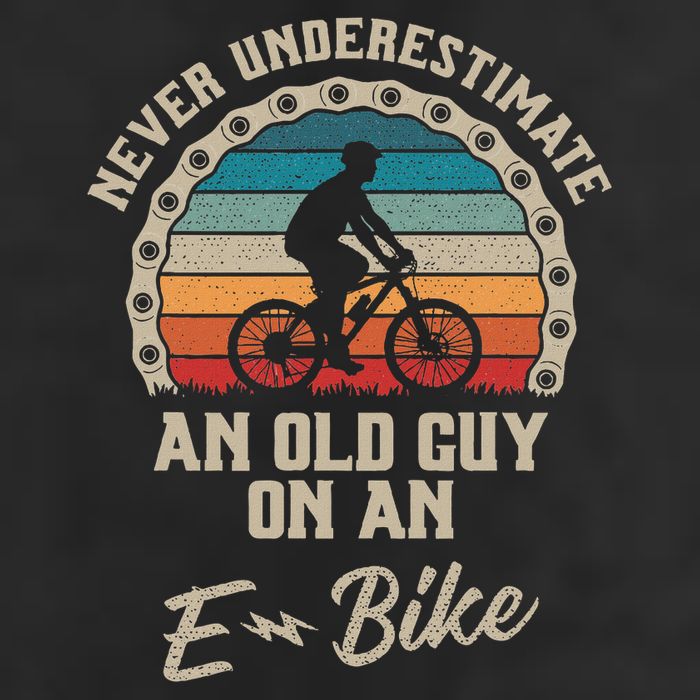 Never Underestimate An Old Guy On An E Bike Biking 7 Panel Mesh Trucker Snapback Hat