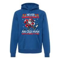 Never Underestimate Old Hockey Stick Santa Snowflakes Cool Gift Premium Hoodie