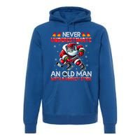 Never Underestimate Old Hockey Stick Santa Snowflakes Gift Premium Hoodie