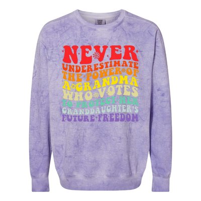 Never Underestimate The Power Of A Grandma Who Votes Groovy Colorblast Crewneck Sweatshirt