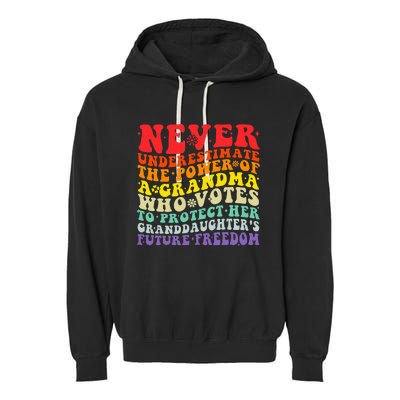 Never Underestimate The Power Of A Grandma Who Votes Groovy Garment-Dyed Fleece Hoodie