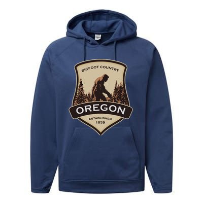 Oregon And A Bigfoot Or A Sasquatch Performance Fleece Hoodie