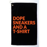 Orange And White Dope Sneakers And A Golf Towel