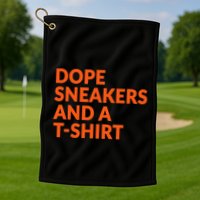 Orange And White Dope Sneakers And A Golf Towel
