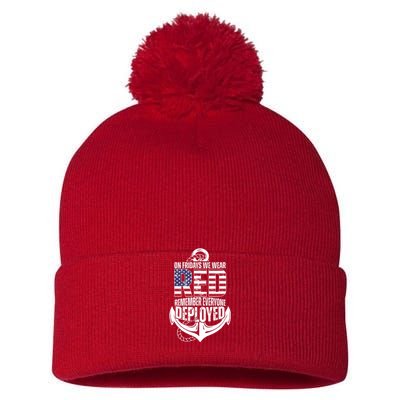 On Fridays We Wear Red Remember Everyone Deployed Pom Pom 12in Knit Beanie