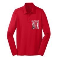 On Friday We Wear Red Veteran Red Friday US Flag Silk Touch Performance Long Sleeve Polo