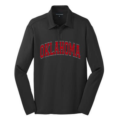 Oklahoma Ok Varsity Style Red Text Silk Touch Performance Long Sleeve Polo