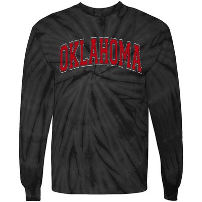 Oklahoma Ok Varsity Style Red Text Tie-Dye Long Sleeve Shirt