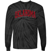 Oklahoma Ok Varsity Style Red Text Tie-Dye Long Sleeve Shirt