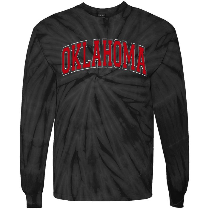 Oklahoma Ok Varsity Style Red Text Tie-Dye Long Sleeve Shirt